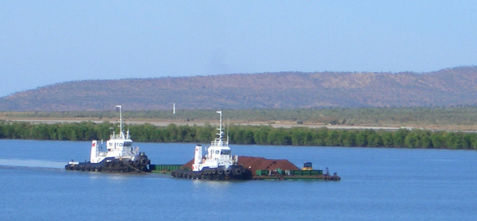 Tugs transporting Barges to Vessel